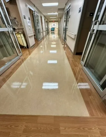 Polished floor in a medical facility corridor