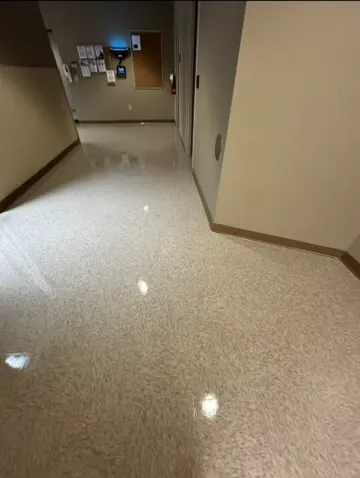 Speckled tile corridor, freshly cleaned