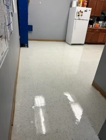 Office kitchenette with a polished floor